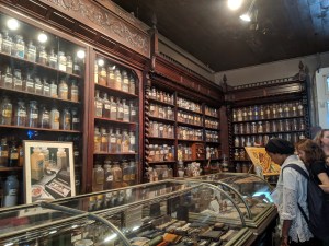 Bookcases of dried herbs and chemicals at the New Orleans Pharmacy Museum.